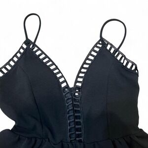 Large black romper with cutout